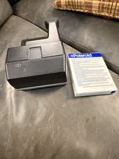 Polaroid Sun 600 SE fotocamera pellicola istantanea con pellicola Polaroid 600 confezione sigillata.