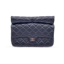 Autentica pochette Chanel anni 2010 nera in pelle trapuntata riedizione rotolo 2,55