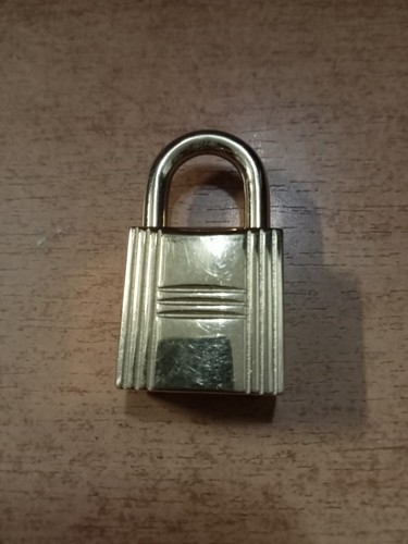 Lucchetto hermès dorato - lucchetto,
