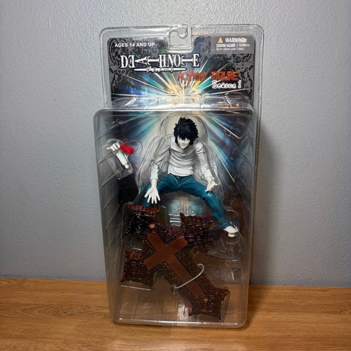 Action figure death - figure, note