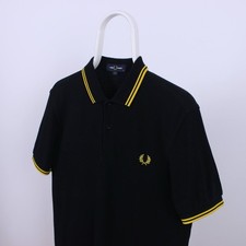 Polo Fred Perry nera e gialla