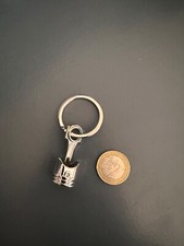 Portachiavi a forma di pistone