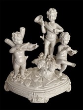 Elegante Scultura in Porcellana Bisquit Capodimonte – Putti Musicanti – H 18 cm