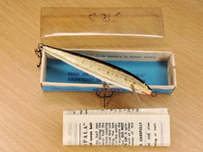 Early Vintage Star Pattern F-9 Kulta Gold Rapala è una scatola increspata con volantino.