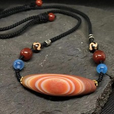 Collana perle amuleto Dzi