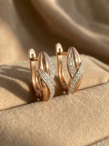 Orecchini design foglia oro