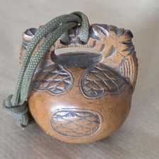 Netsuke en bois. Mokugyo aux