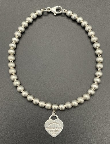 Bracciale tiffany co - co, argento