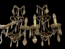 Coppia di antiche applique con