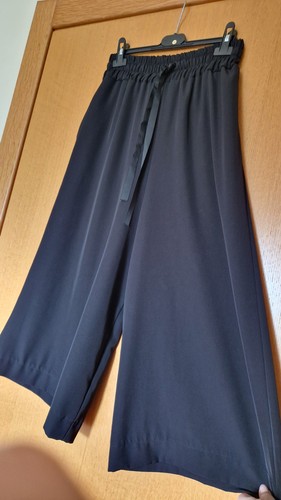 Pantaloni neri larghi