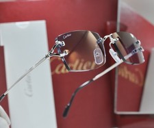 Nuovi occhiali da sole Cartier senza montatura in metallo placcato oro CT0550S