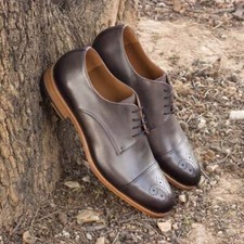 Scarpe in pura pelle grigio