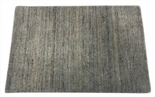 Tappeto In Lana Intrecciato