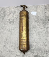 Antico estintore in ottone