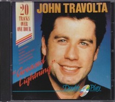 JOHN TRAVOLTA / CREASED
