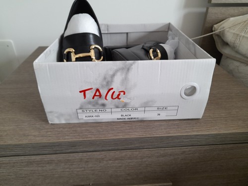 Mocassino nero ecopelle con - in,