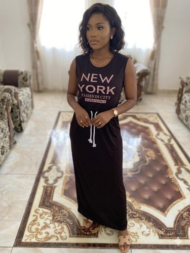 Tight fitting sleeveless - a, tight-fitting,