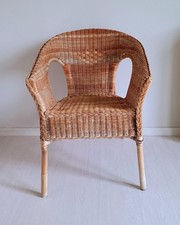 Elegante poltroncina in rattan intrecciato