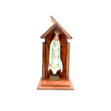 Wooden niche with statue of