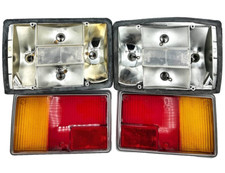 CORPI FANALI POSTERIORI + PLASTICHE PER PEUGEOT 104 I° SERIE SEIMA + FRANKANI