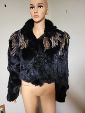 Giacca nera in pelliccia di