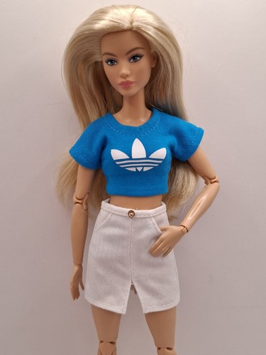 Gonna bianca top blu - top,