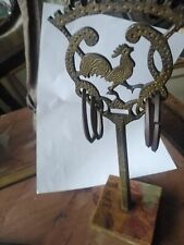 Caveja romagnola. Metallo e onice.