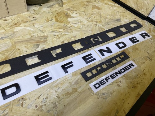 Defender scritte nero - scritte,