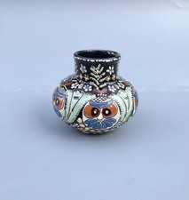 Antico vaso camino gufo