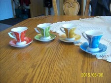 Set 4 tazze e piattini da