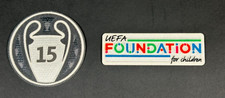 REAL MADRID 15 X SLEEVE PATCH + TOPPA FONDOTINTA UEFA EDIZIONE UFFICIALE