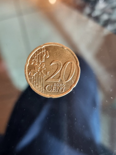 Una moneta euro 20 - una,