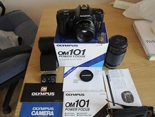 Olympus OM101 con obiettivo zoom Makinon e flash T20