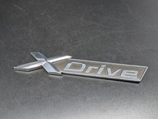 BMW X DRIVE 97MM X-DRIVE LOGO SIGLA EMBLEMA FREGIO STEMMA SCRITTA BADGE TARGA