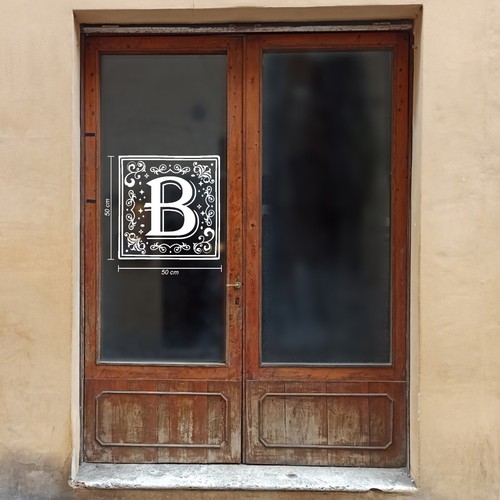 Lettera iniziale decorativa