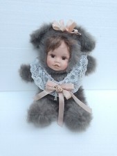 Bambolotto Peluche porcellana Con Carillon Carica Manuale