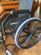 SEDIA A ROTELLE SURACE