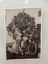 Natale anni 50 bambino su cavalluccio foto Berluti Carbonia