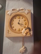 orologio a pendolo con Angelo