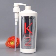 With Pump Kerastase Premiere
