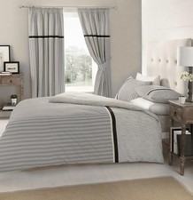 Set piumone grigio