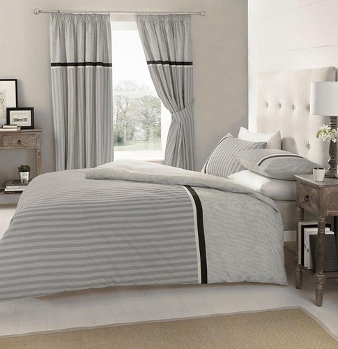 Set piumone grigio