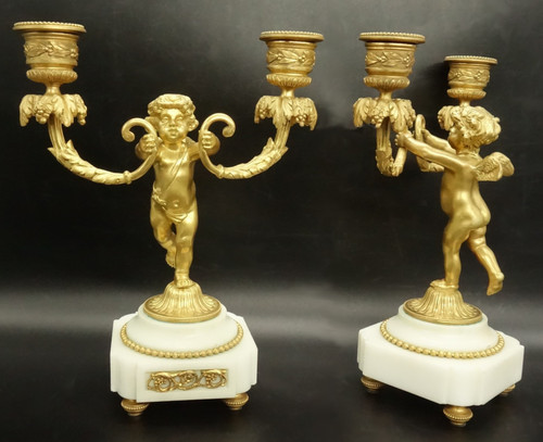 Coppia portacandele putti - portacandele,