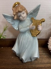 Reggiseno. Statuina angelo con