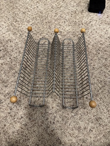 Metal wire with wood knobs - , cd
