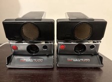 2 Polaroid Sx 70 Sonar Land Camera Autofocus Con Una Borsa
