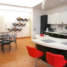 cucina ARAN laccata lucida completa di elettrodomestici con isola curva perfetta