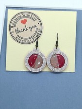 Orecchini in soutache nei toni del rosa con centrale dipinto a mano. Unico pezzo