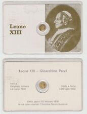 Tessera con moneta in oro