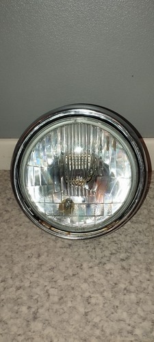 Phare moto honda 750 dc - ",